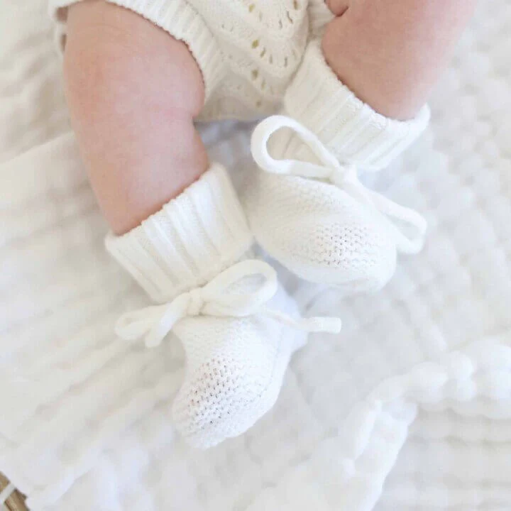 10627-knit-newborn-bow-booties-1.jpg