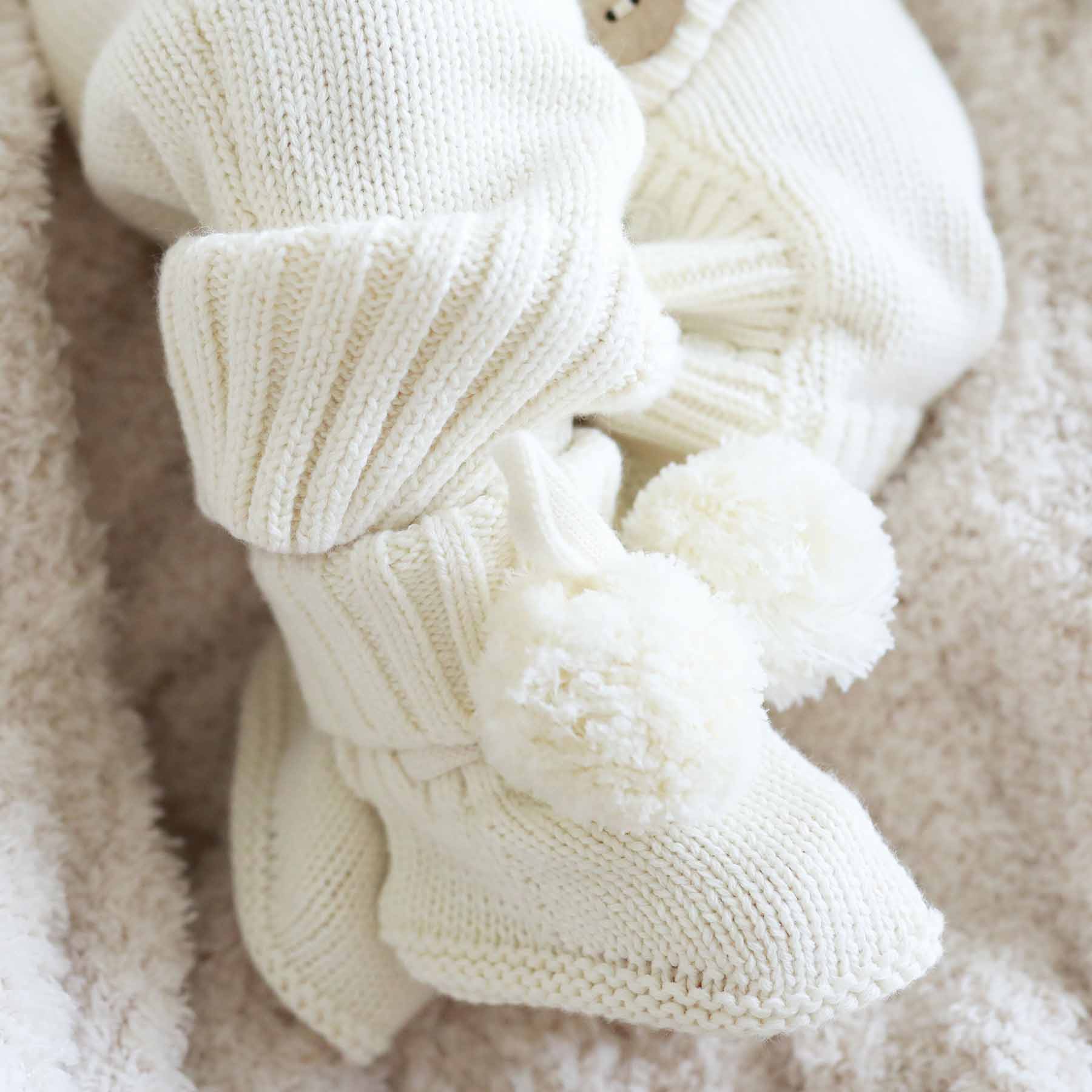 10649-knit-pom-pom-baby-booties-ivory-1.jpg