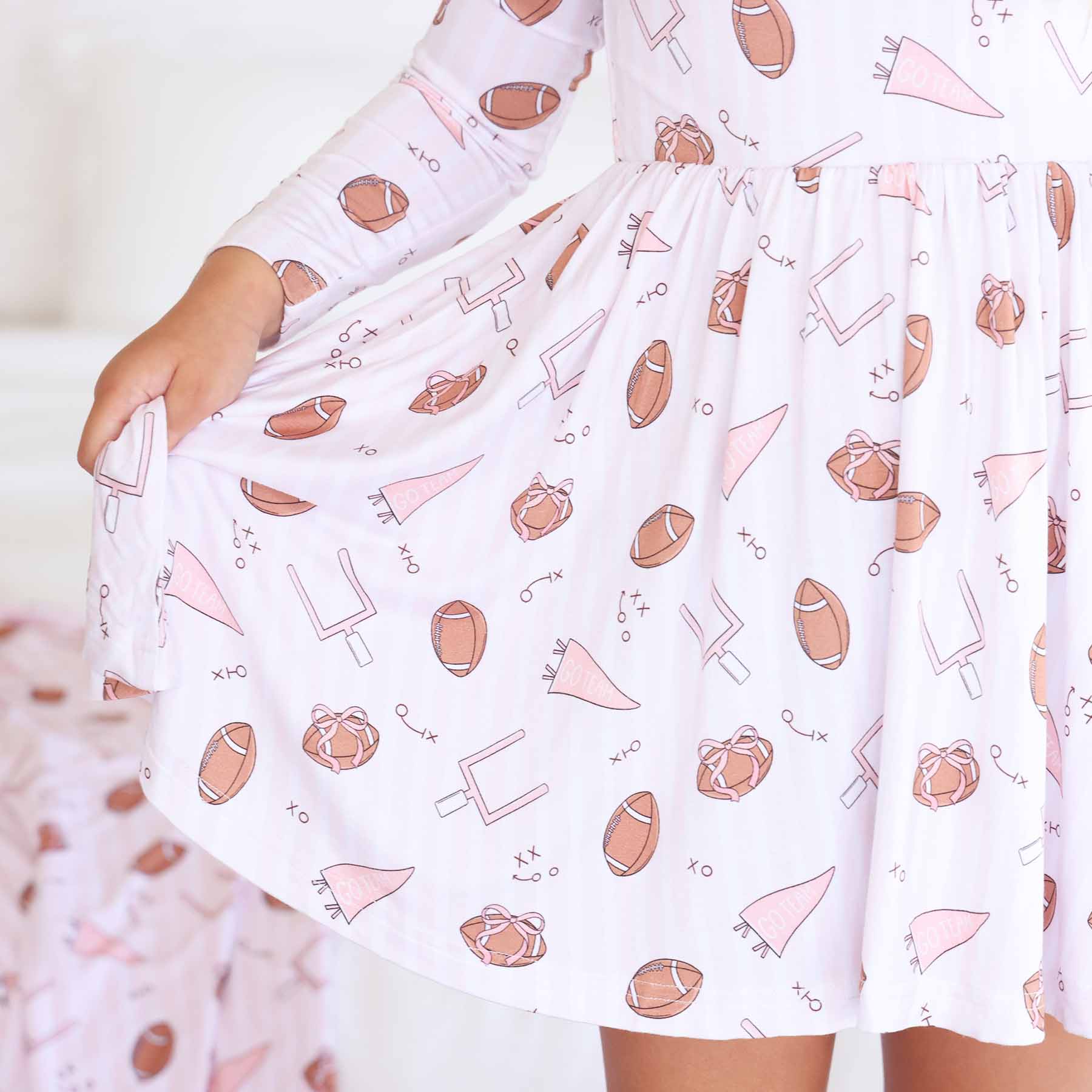 11163-long-sleeve-twirl-dress-tiny-touchdowns-pink-1.jpg