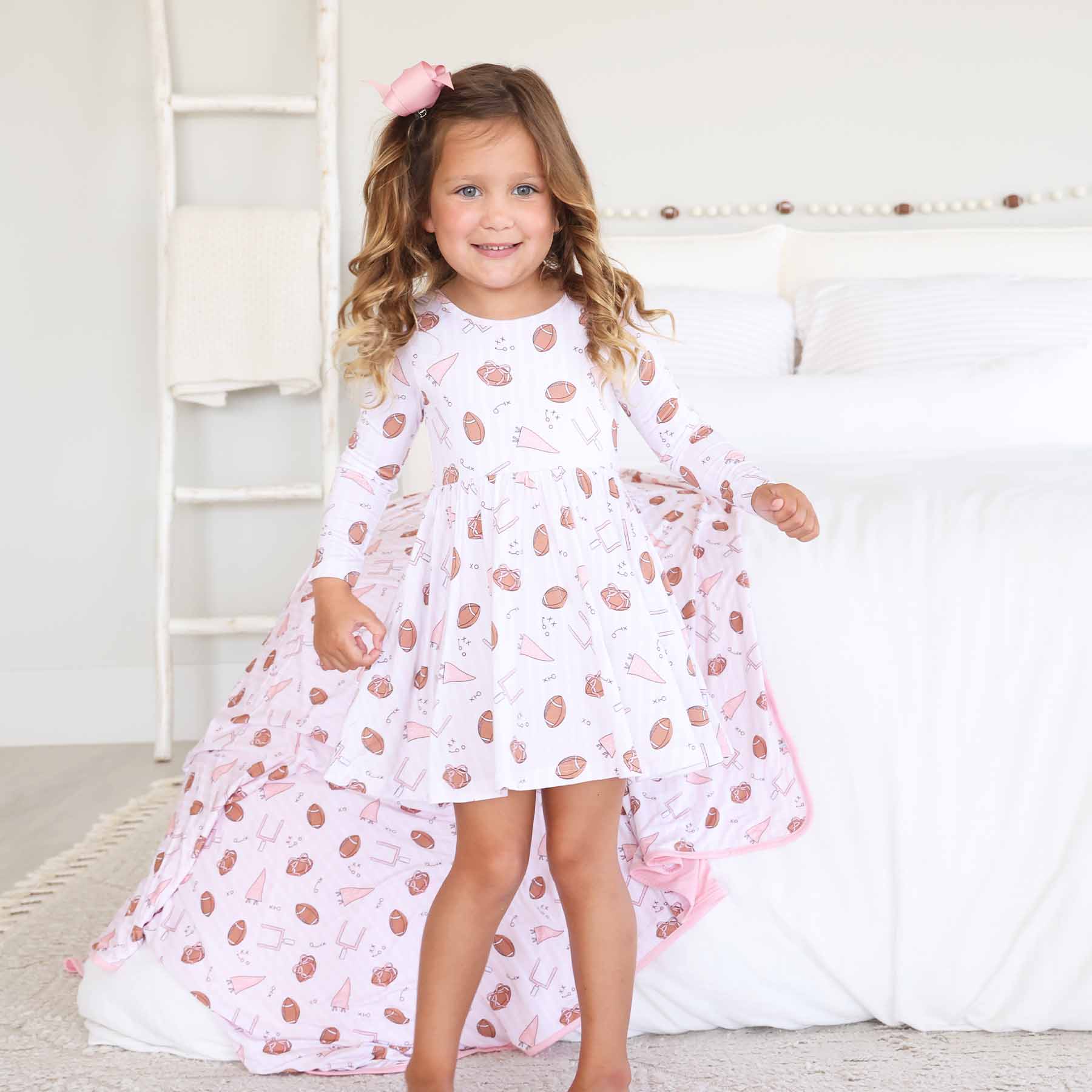11163-long-sleeve-twirl-dress-tiny-touchdowns-pink-1.jpg