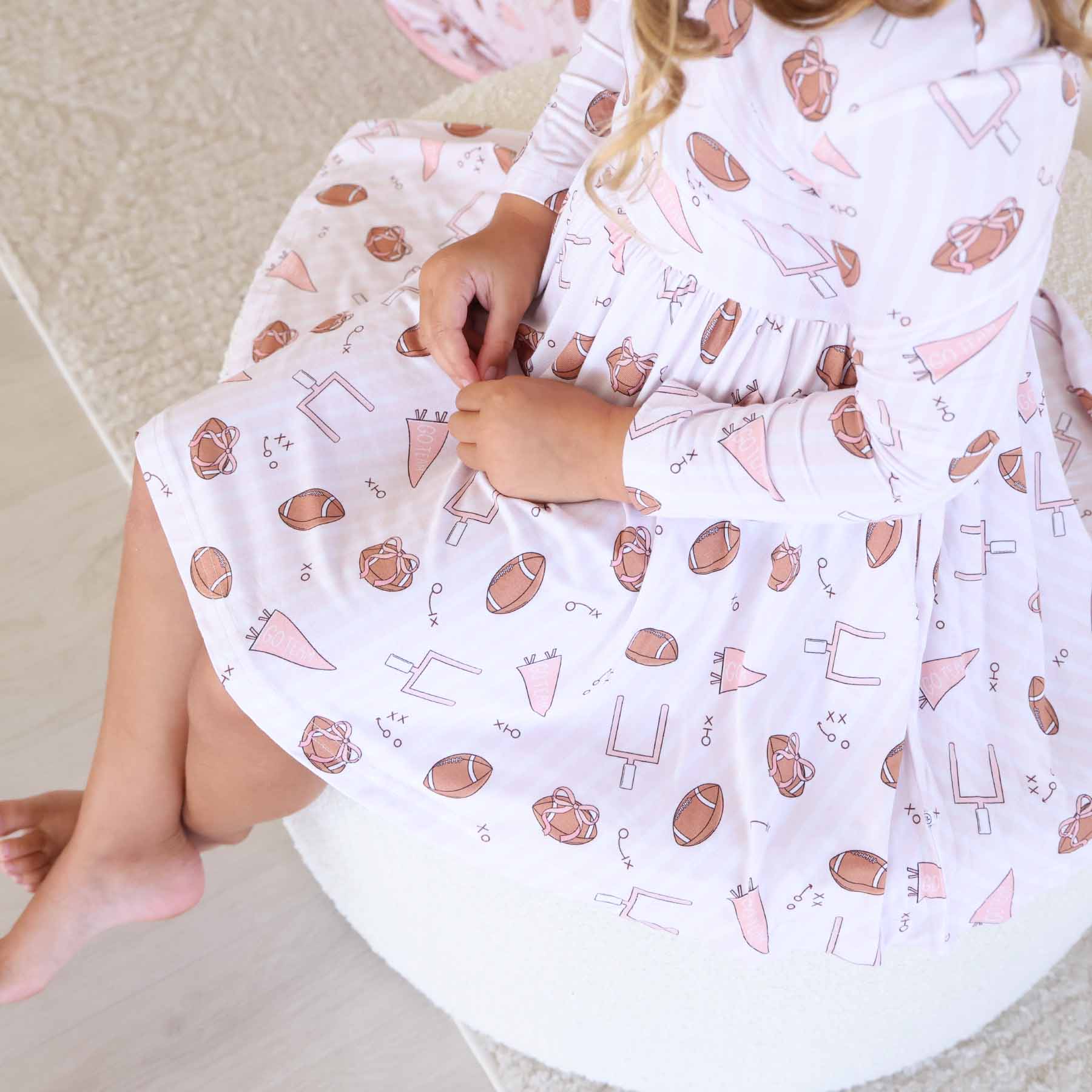 11163-long-sleeve-twirl-dress-tiny-touchdowns-pink-1.jpg