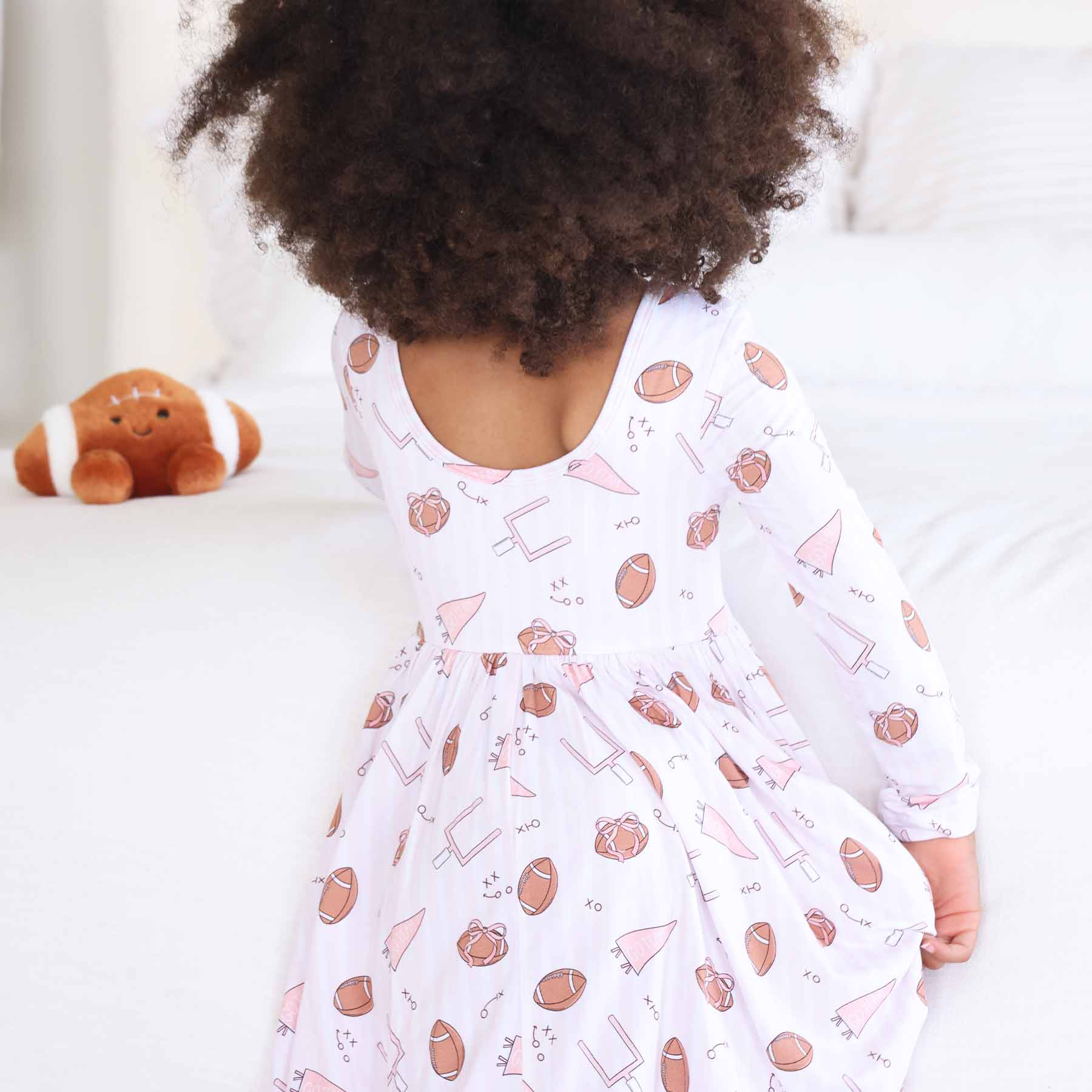 11163-long-sleeve-twirl-dress-tiny-touchdowns-pink-1.jpg