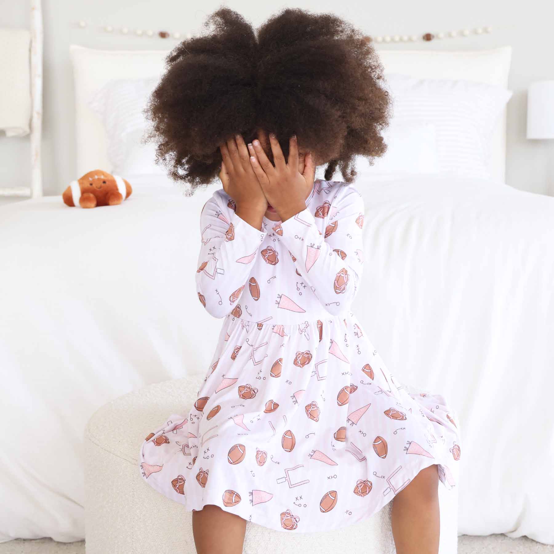 11163-long-sleeve-twirl-dress-tiny-touchdowns-pink-1.jpg