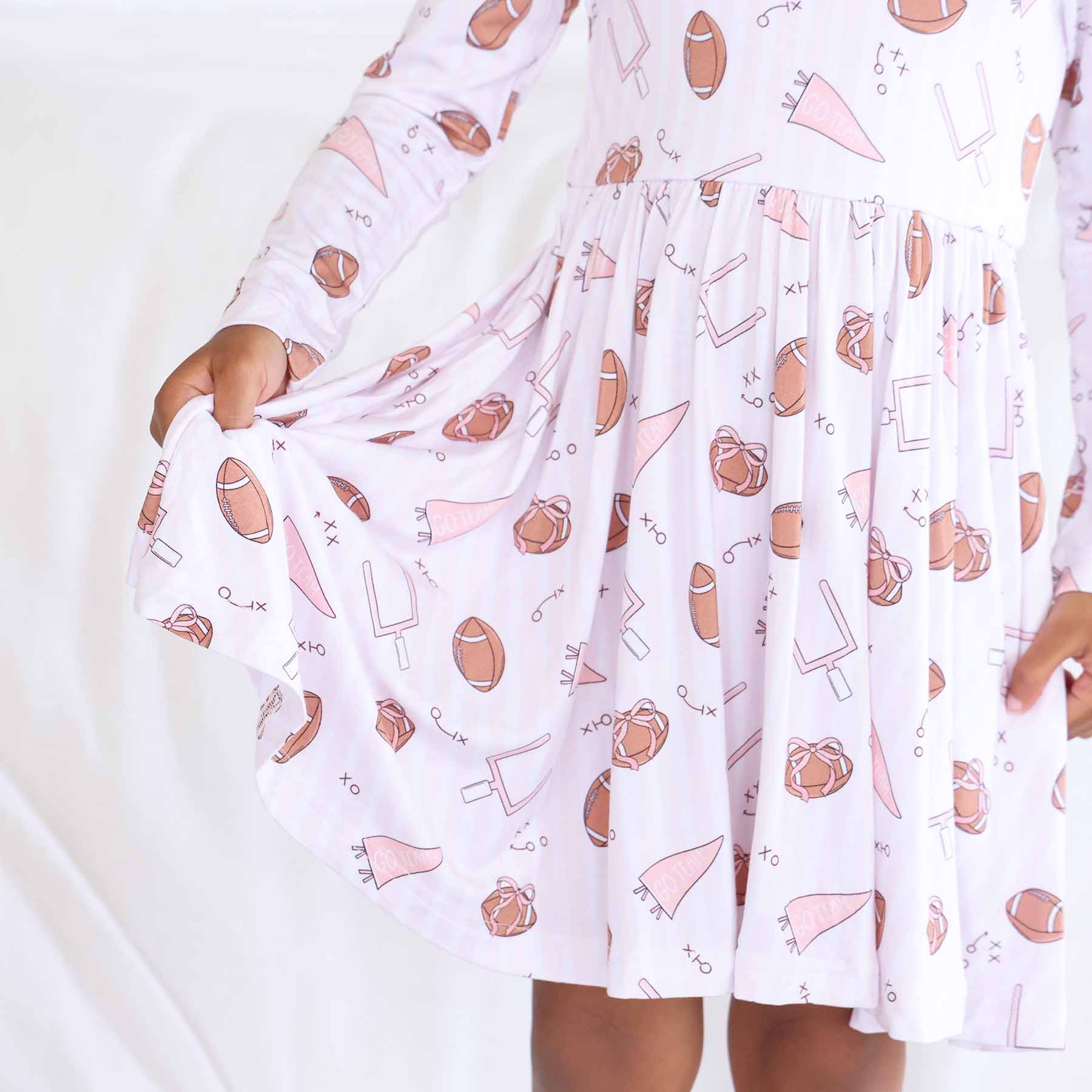 11163-long-sleeve-twirl-dress-tiny-touchdowns-pink-1.jpg