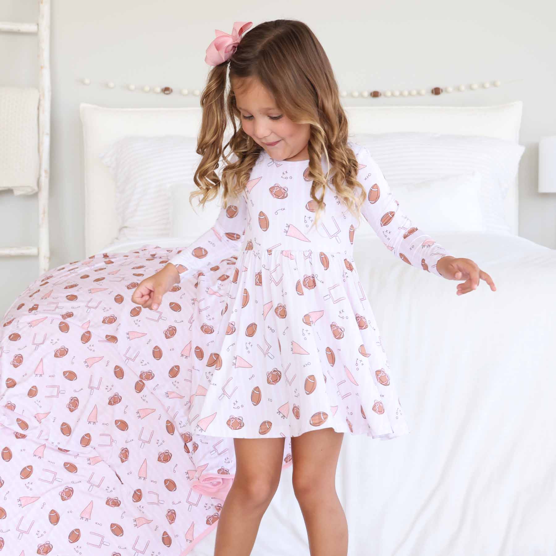 11163-long-sleeve-twirl-dress-tiny-touchdowns-pink-1.jpg