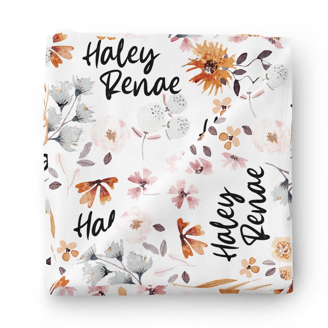 11168-lorelai-s-floral-personalized-baby-name-swaddle-blanket-1.jpg