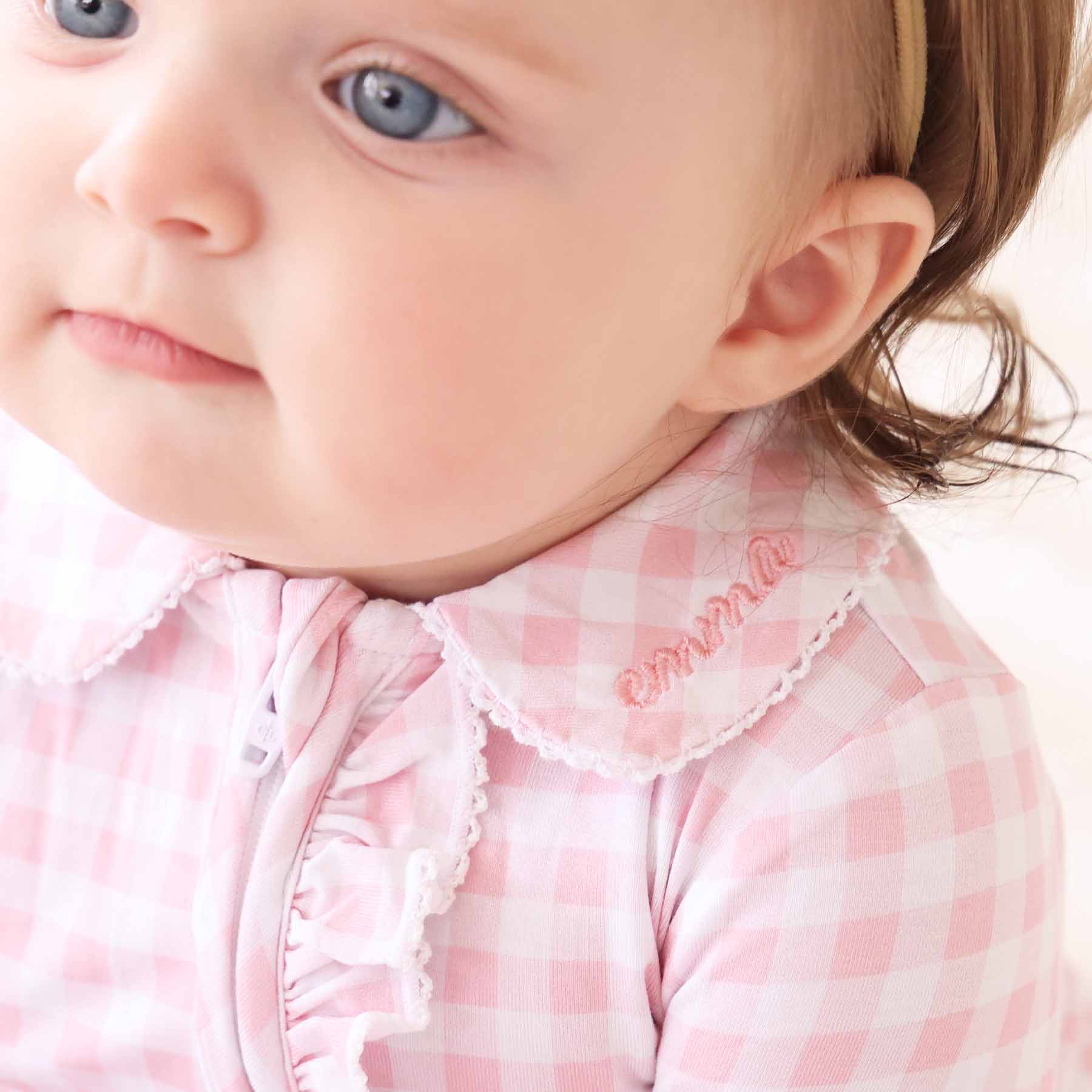 13193-peter-pan-collar-ruffle-zipper-footie-rosy-gingham-1.jpg
