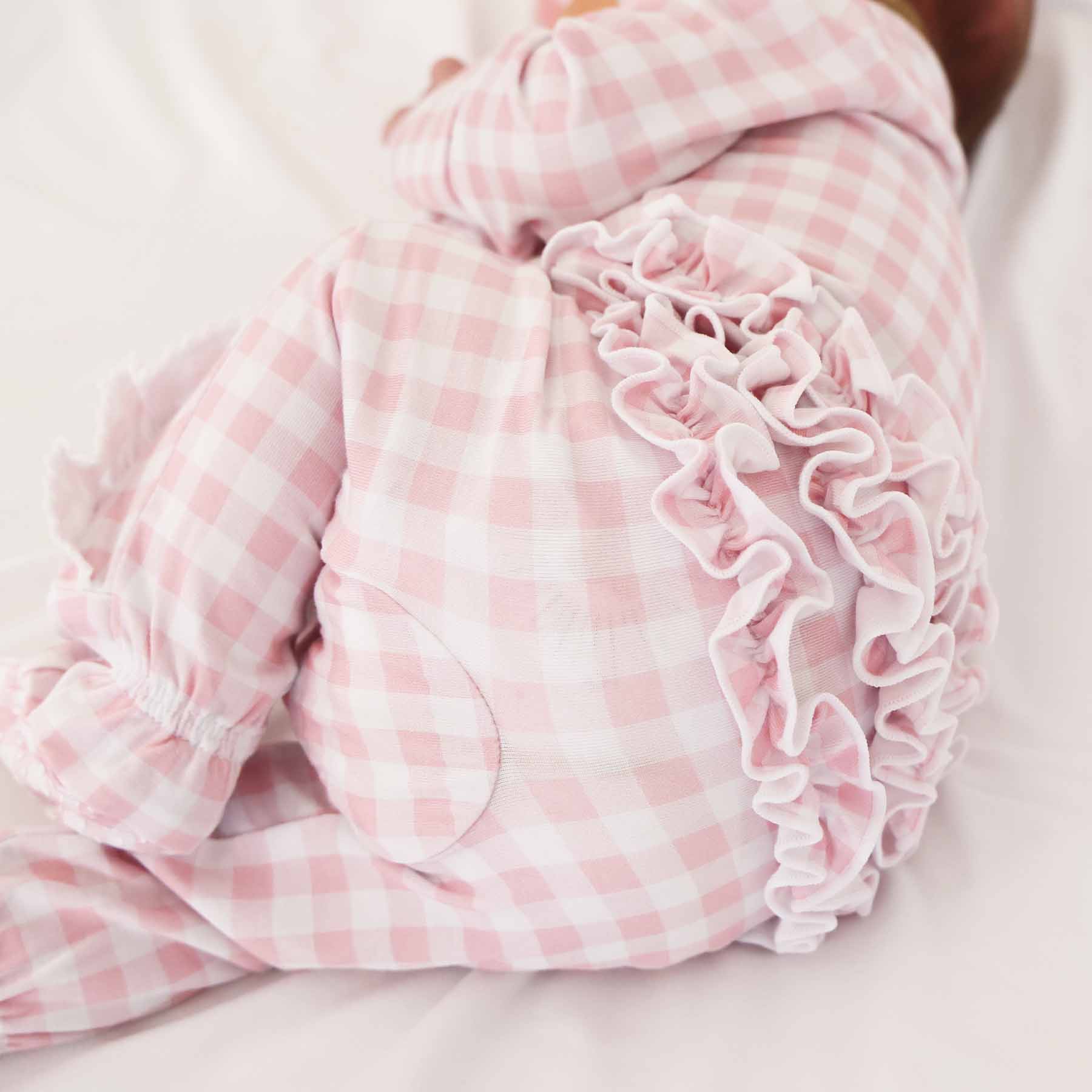 13193-peter-pan-collar-ruffle-zipper-footie-rosy-gingham-1.jpg