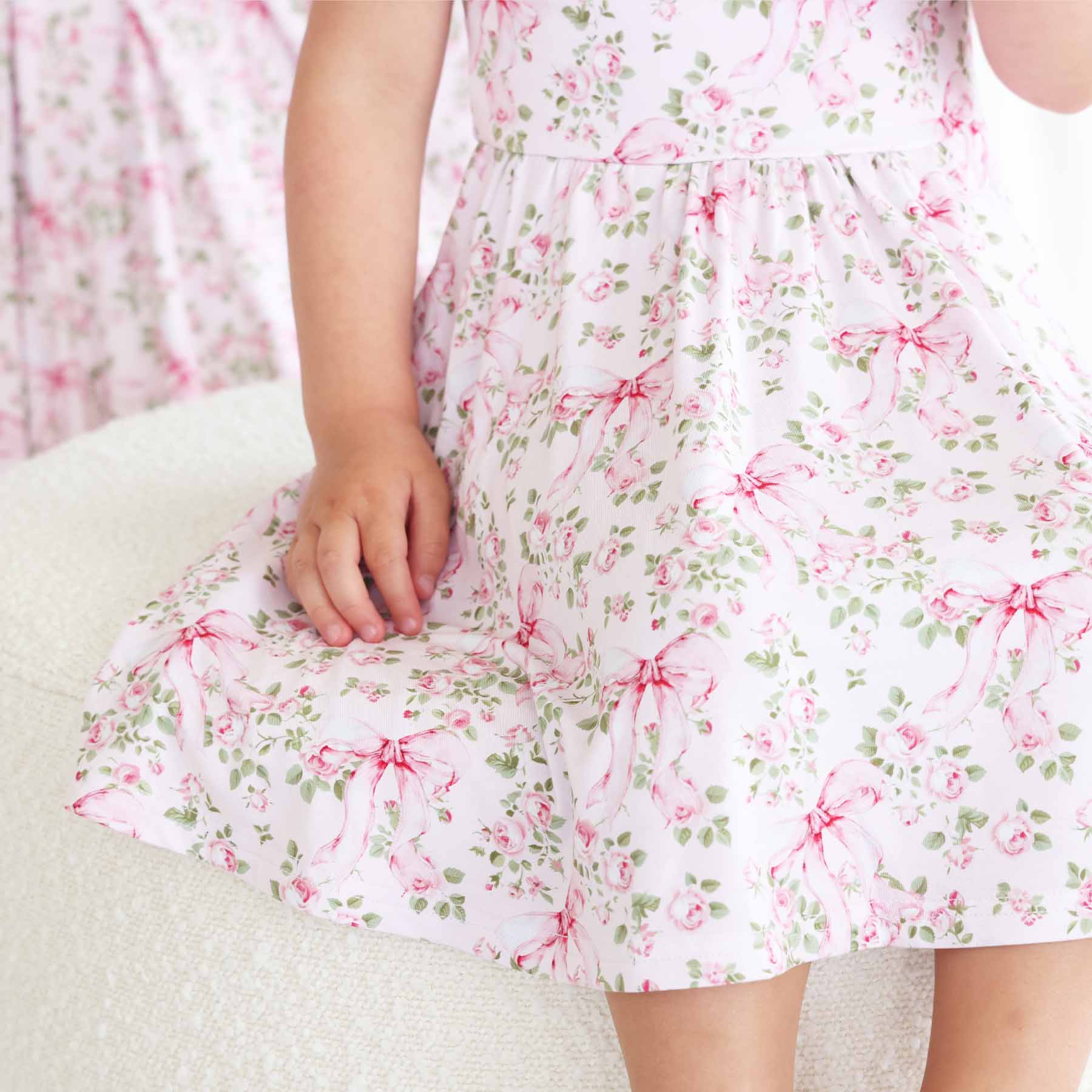 13493-ruffle-twirl-dress-bows-in-bloom-1.jpg
