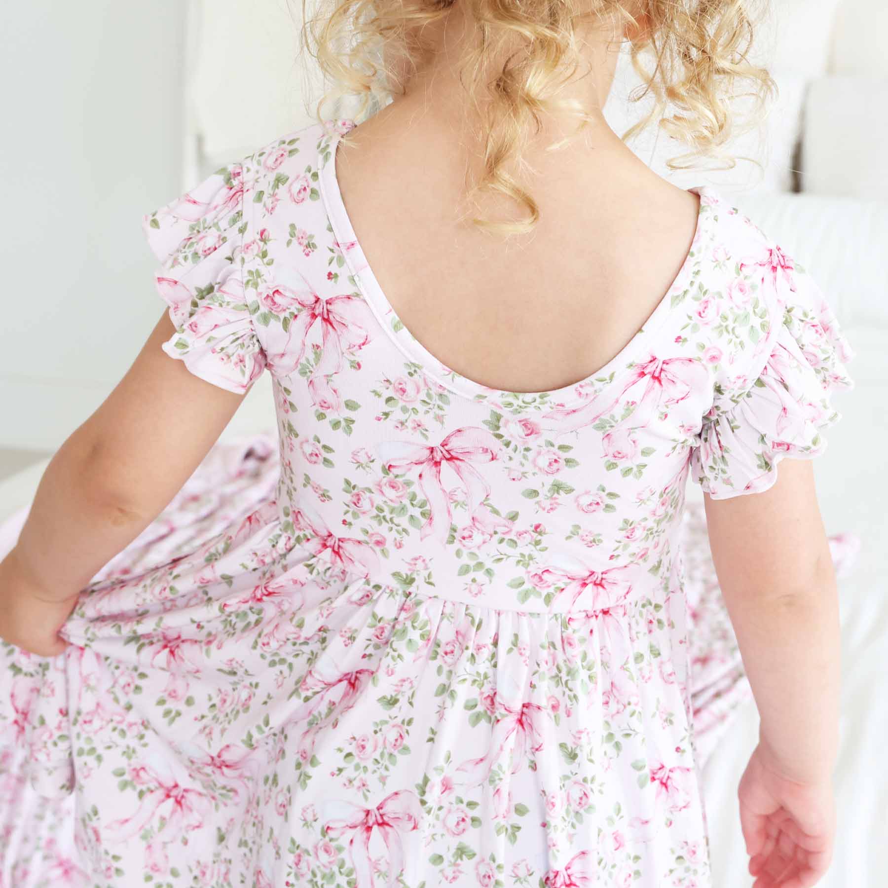 13493-ruffle-twirl-dress-bows-in-bloom-1.jpg