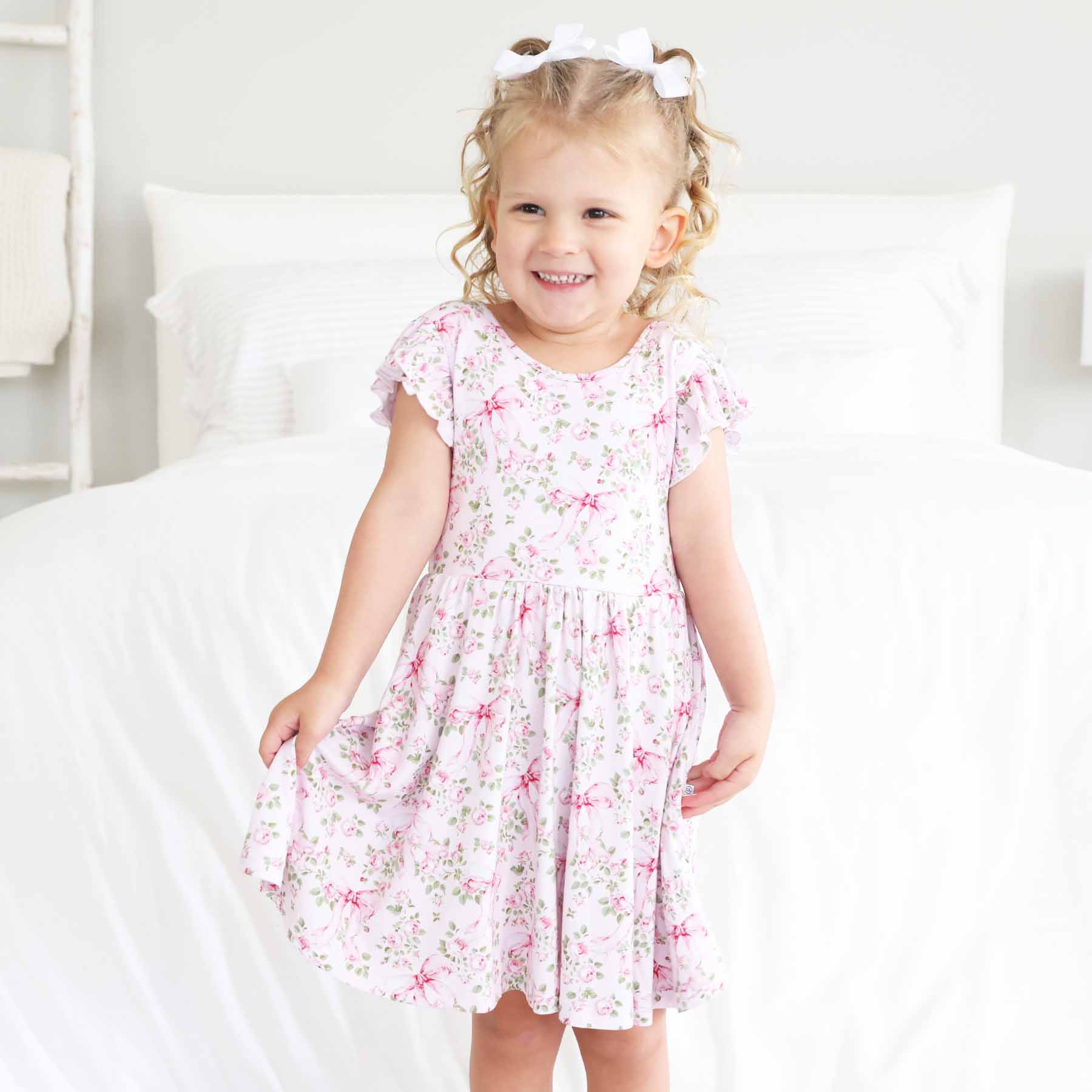 13493-ruffle-twirl-dress-bows-in-bloom-1.jpg