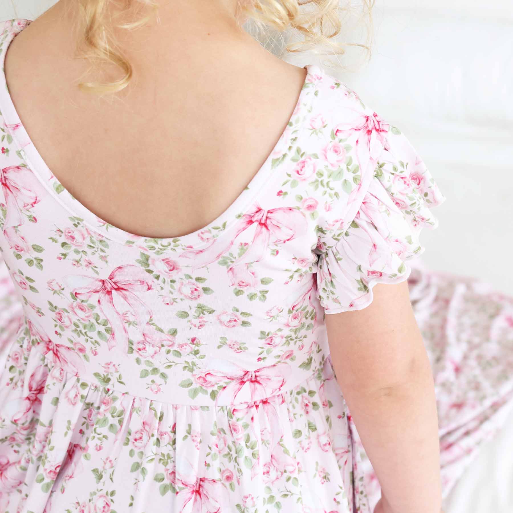 13493-ruffle-twirl-dress-bows-in-bloom-1.jpg