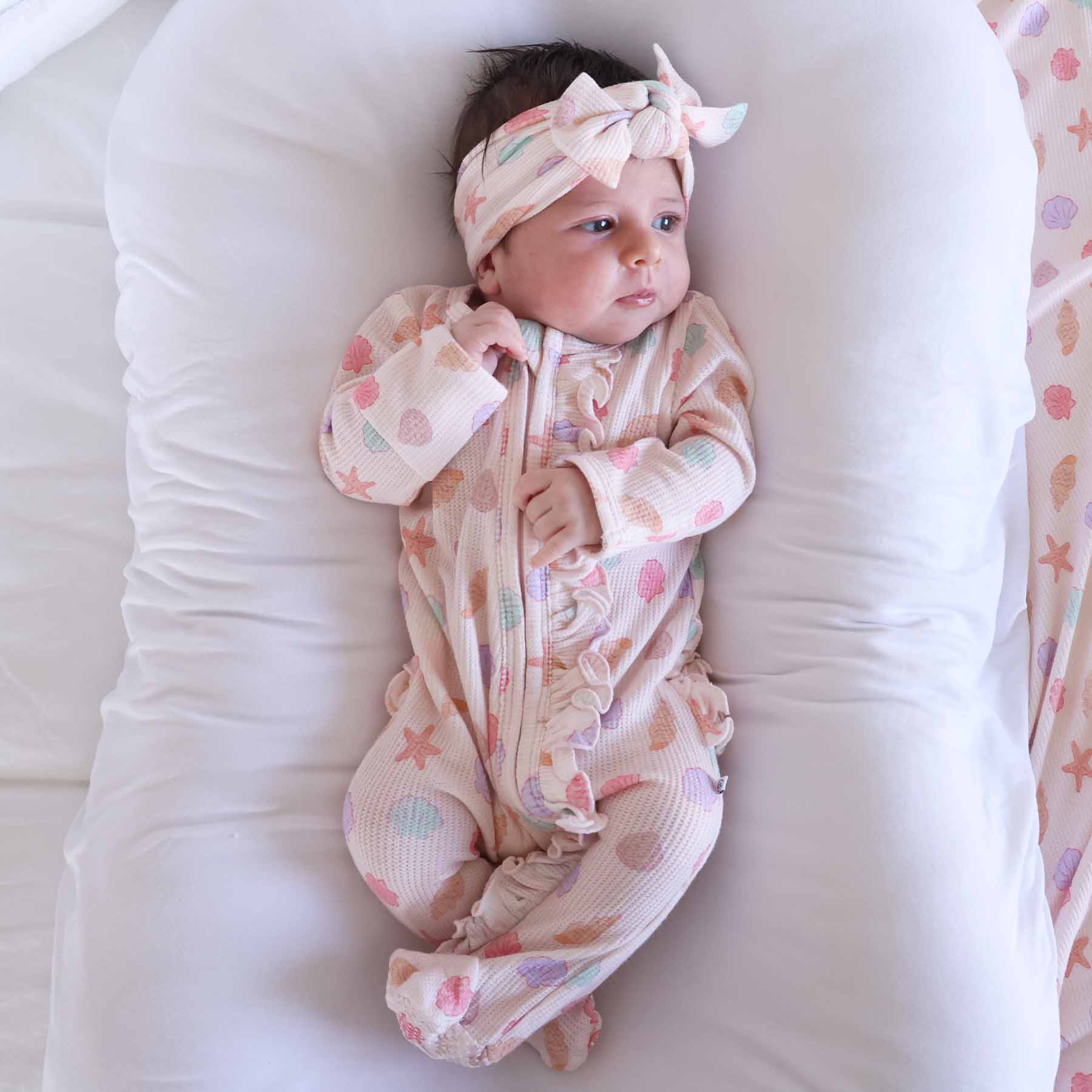 13552-saltwater-shells-bamboo-waffle-zipper-ruffle-footie-1.jpg