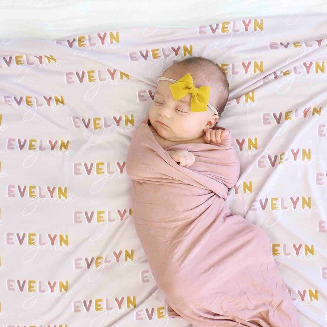 14180-solid-mauve-bamboo-knit-swaddle-blanket-1.jpg