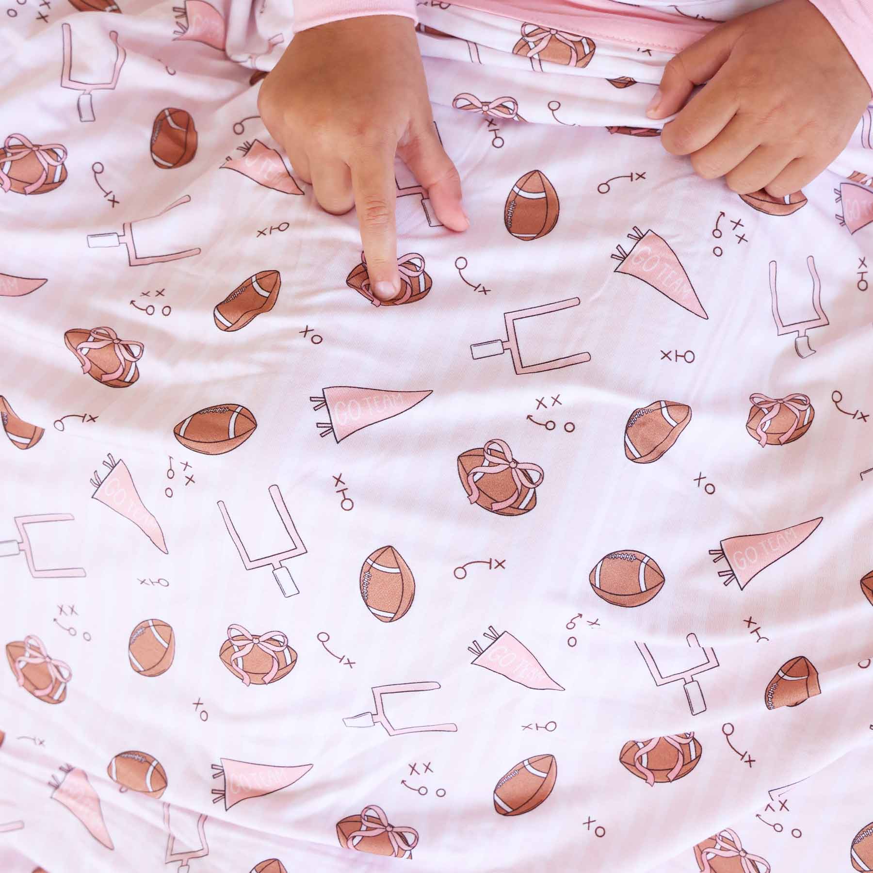 14580-tiny-touchdowns-double-sided-bamboo-blanket-pink-1.jpg