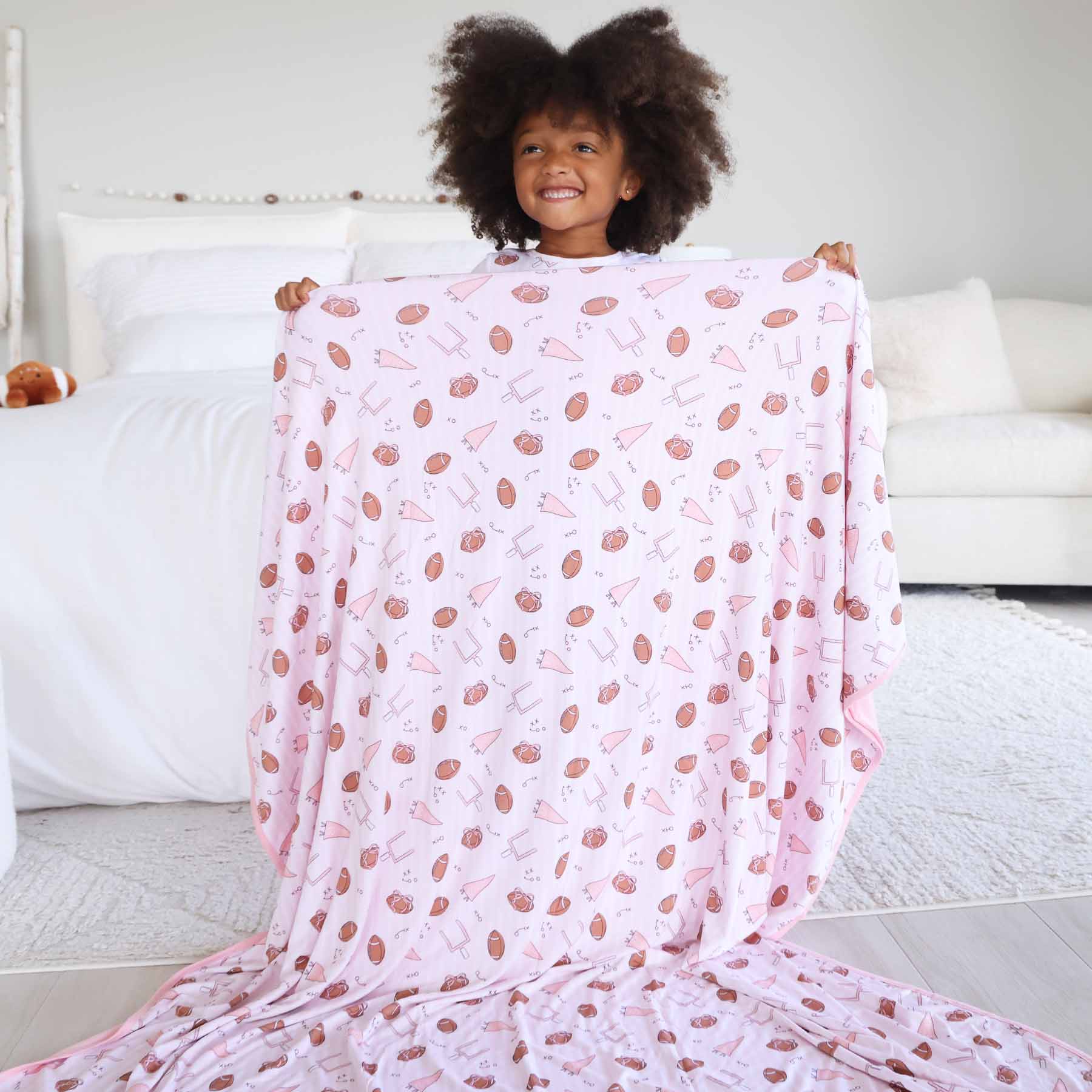 14580-tiny-touchdowns-double-sided-bamboo-blanket-pink-1.jpg