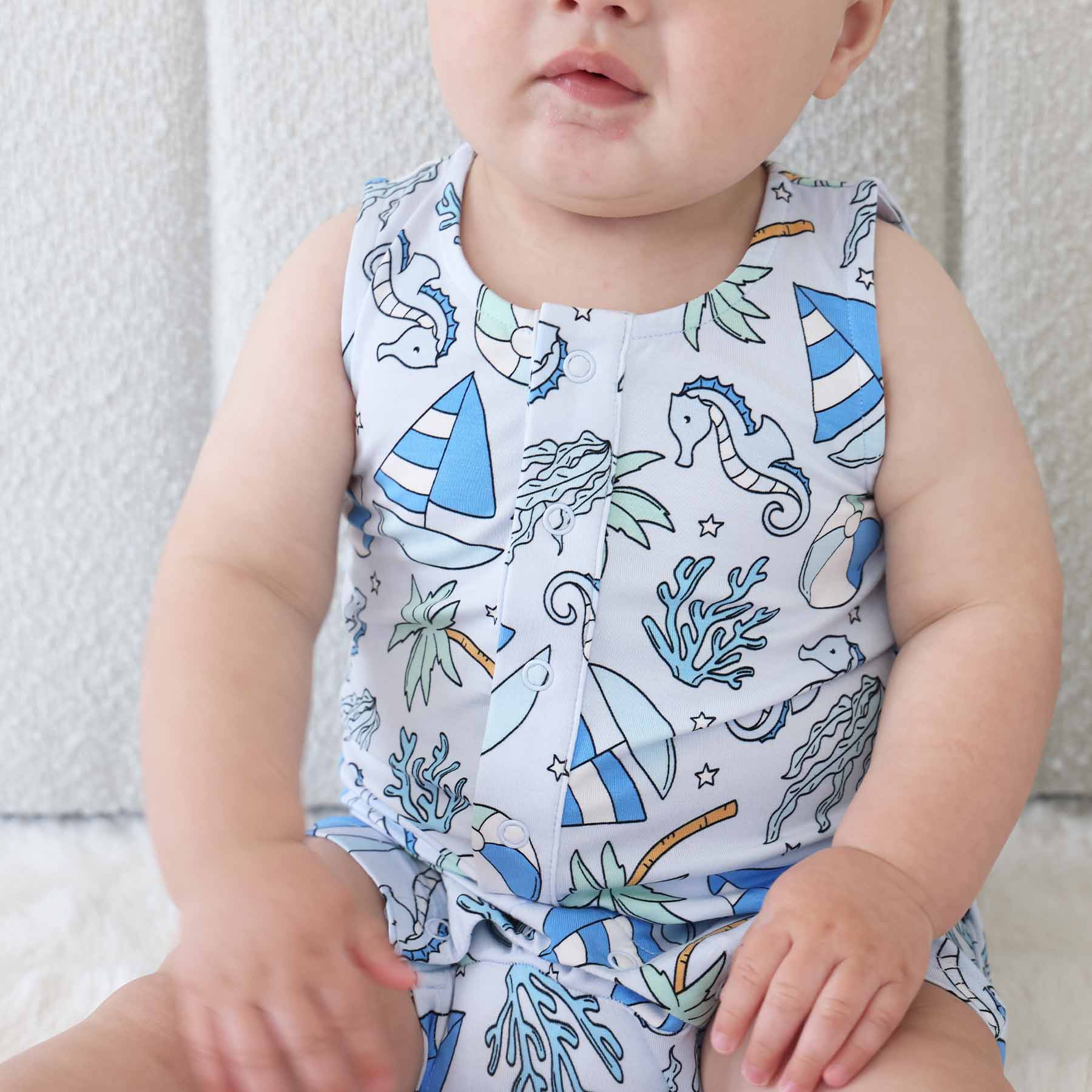 4721-sleeveless-snap-romper-tiny-tides-blue-1.jpg