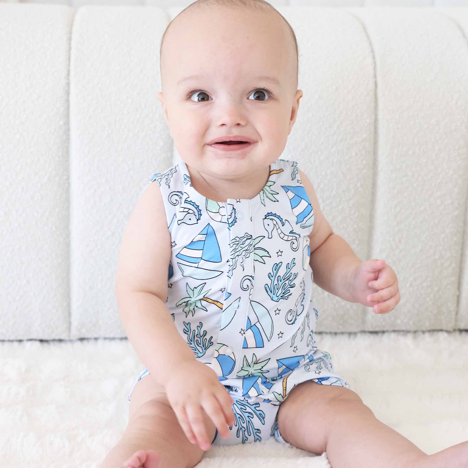 4721-sleeveless-snap-romper-tiny-tides-blue-1.jpg