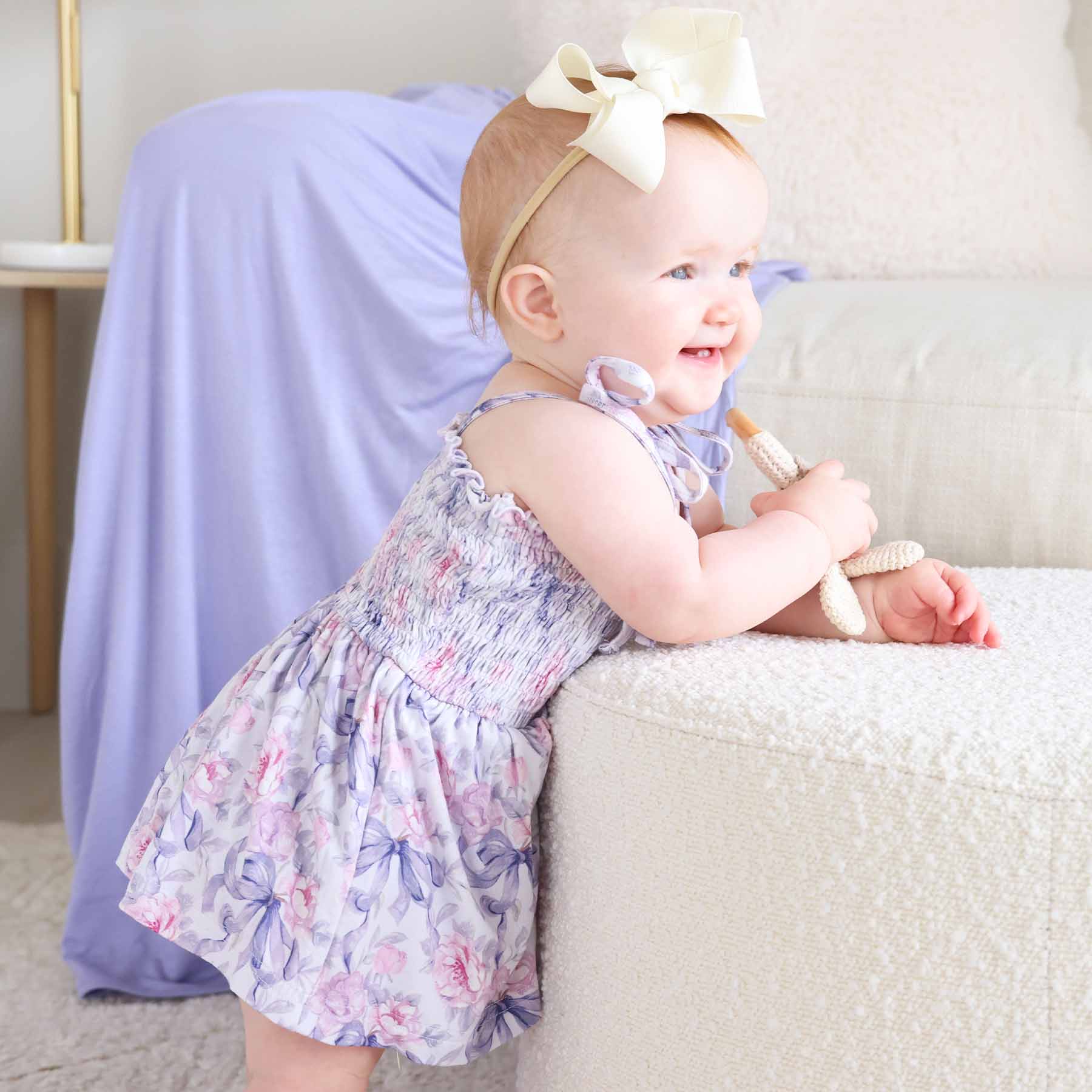 5015-smocked-twirl-bodysuit-leighton-s-lavender-1.jpg