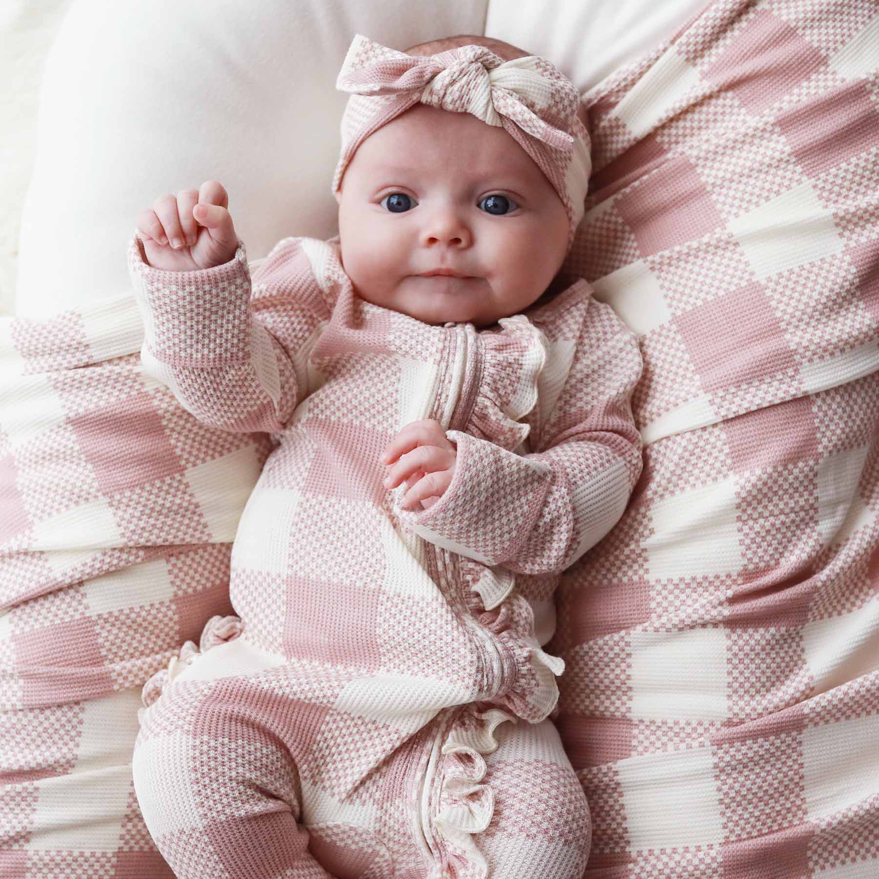 7259-big-check-bamboo-waffle-zipper-ruffle-footie-rosy-1.jpg