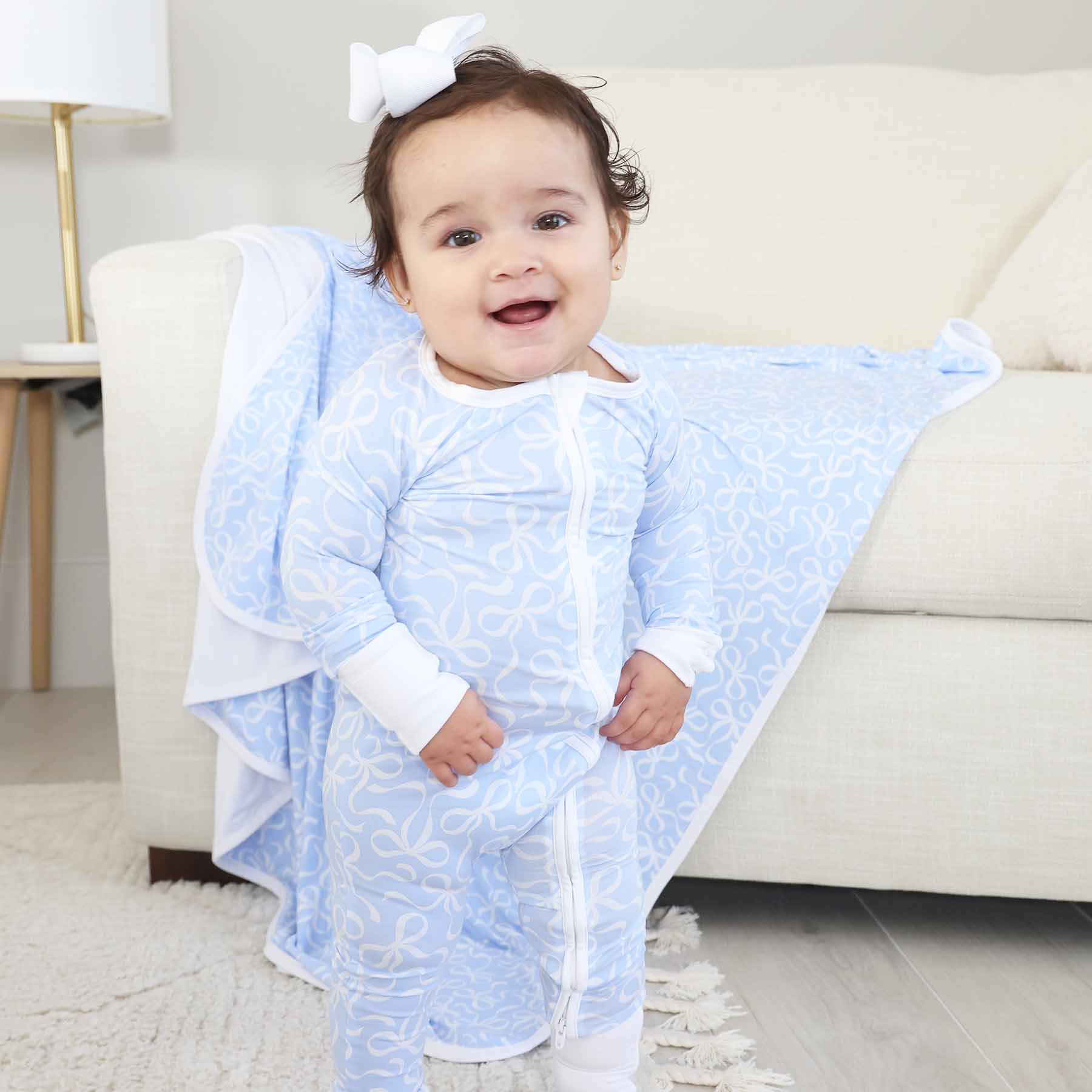 7386-blue-tiful-bows-convertible-zip-romper-1.jpg