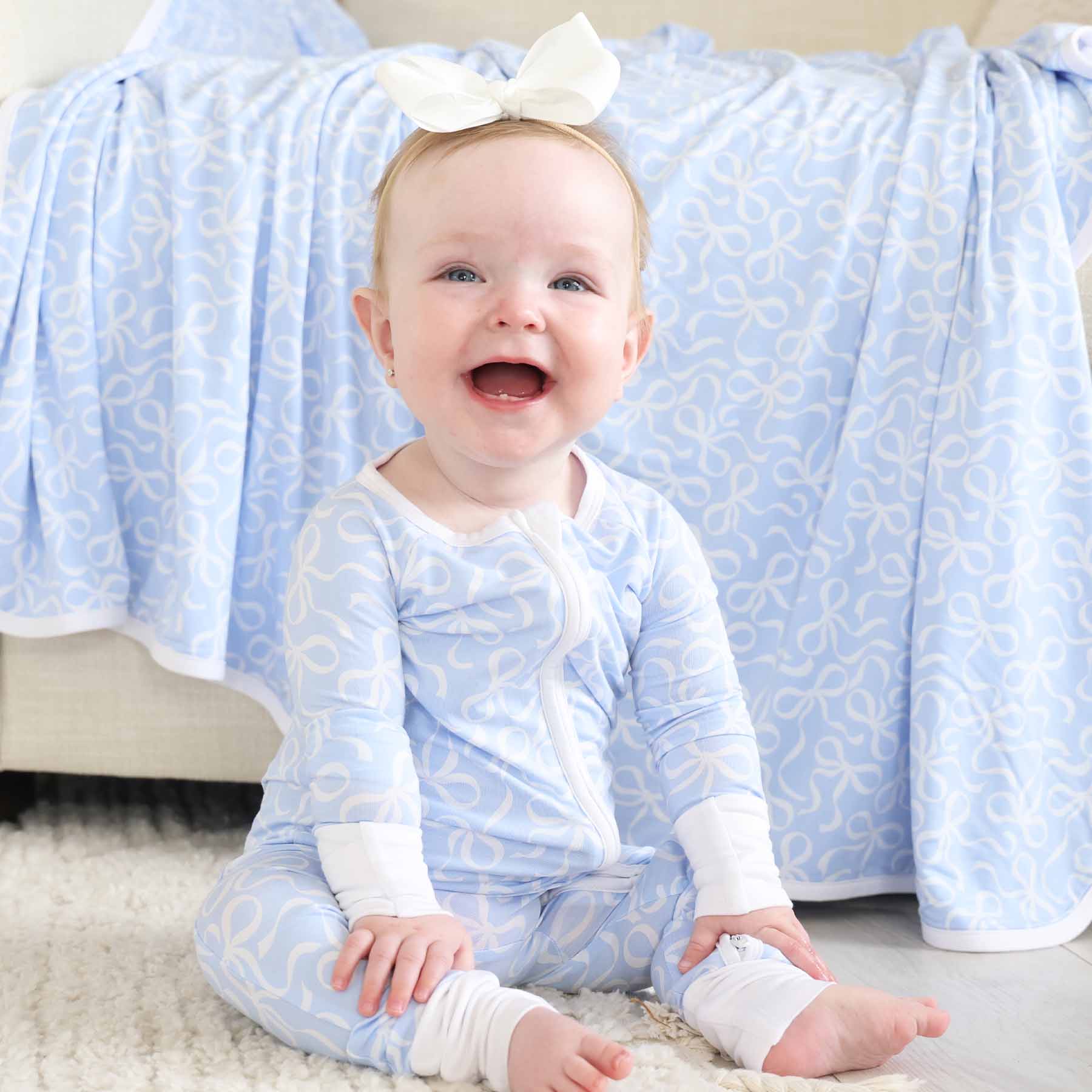 7386-blue-tiful-bows-convertible-zip-romper-1.jpg