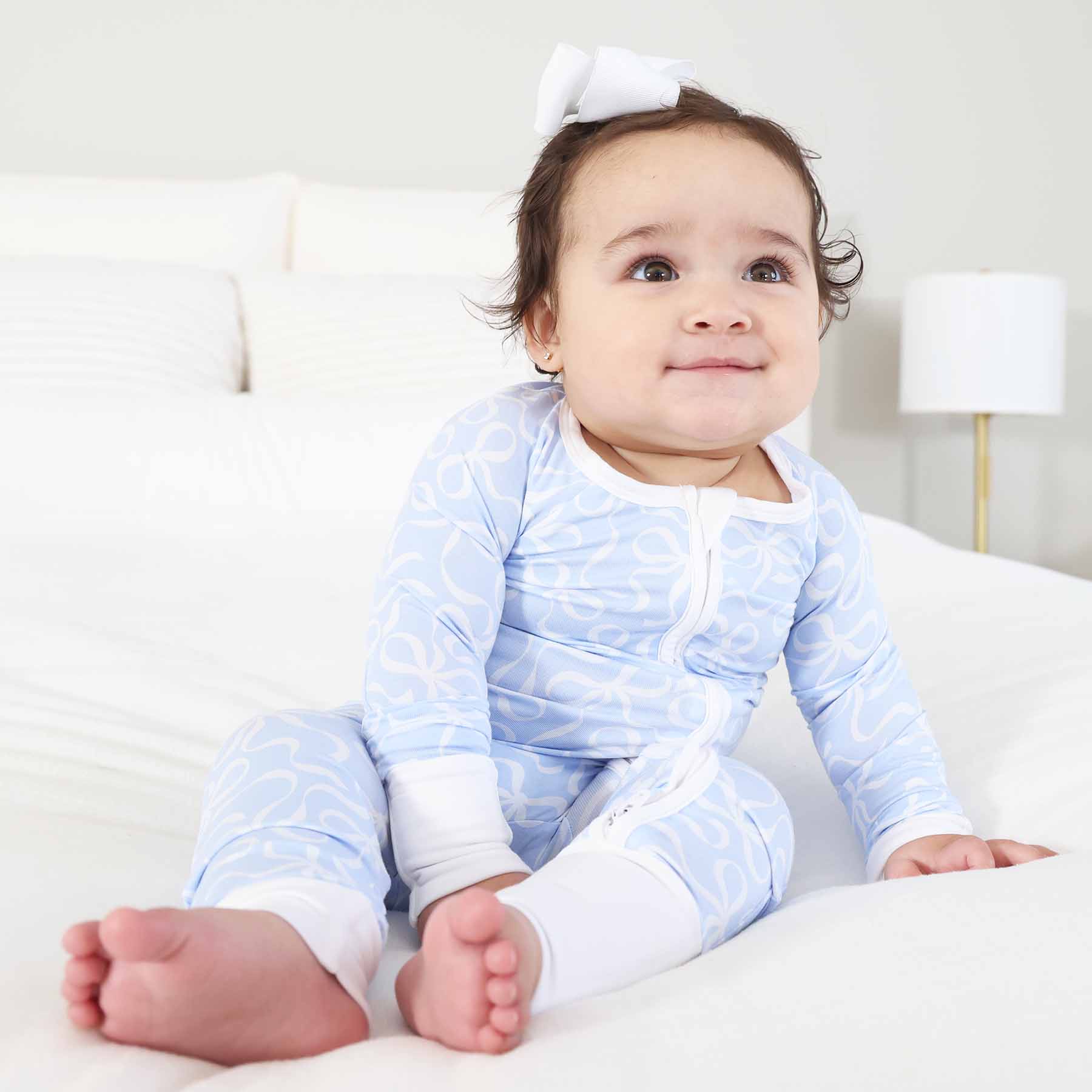 7386-blue-tiful-bows-convertible-zip-romper-1.jpg