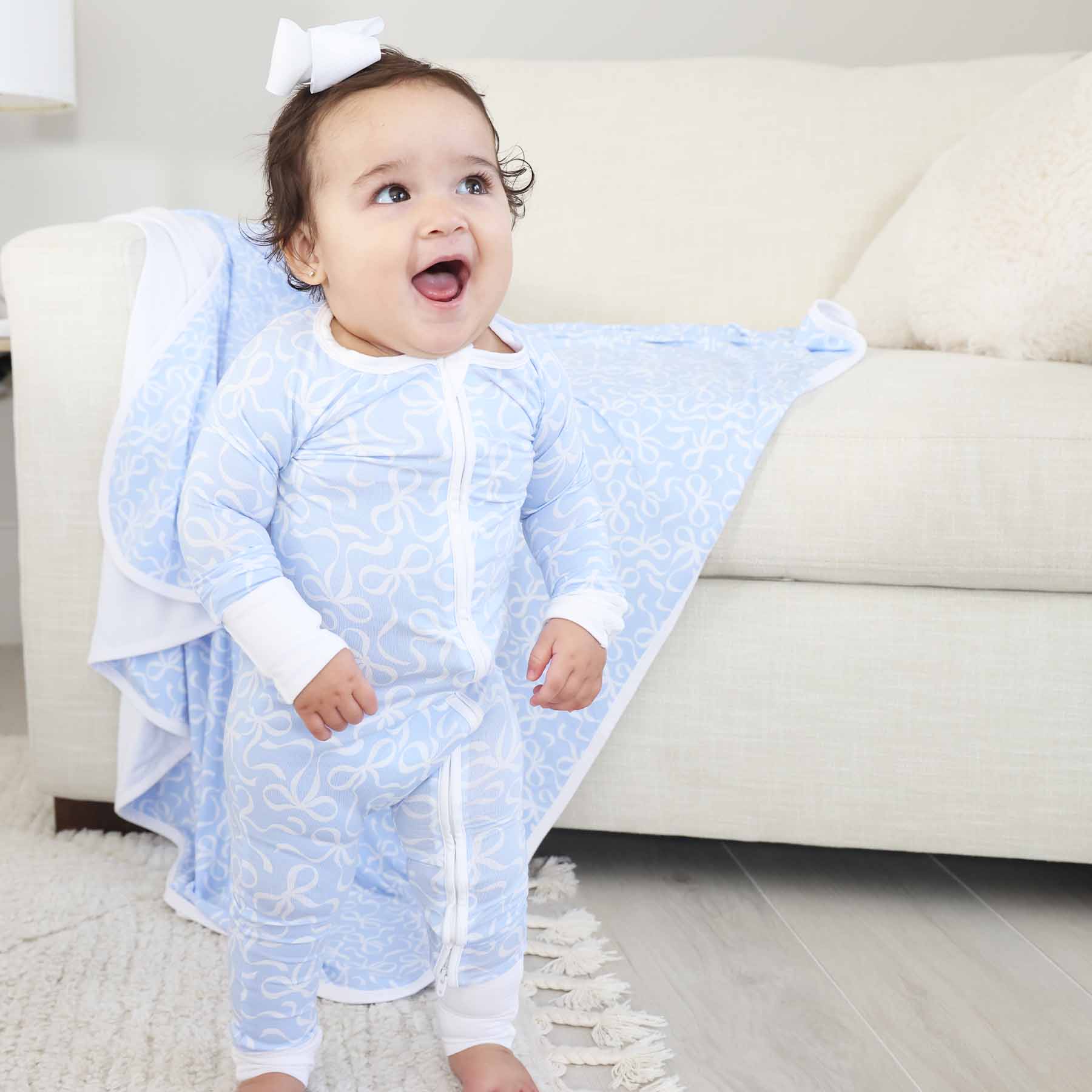 7386-blue-tiful-bows-convertible-zip-romper-1.jpg