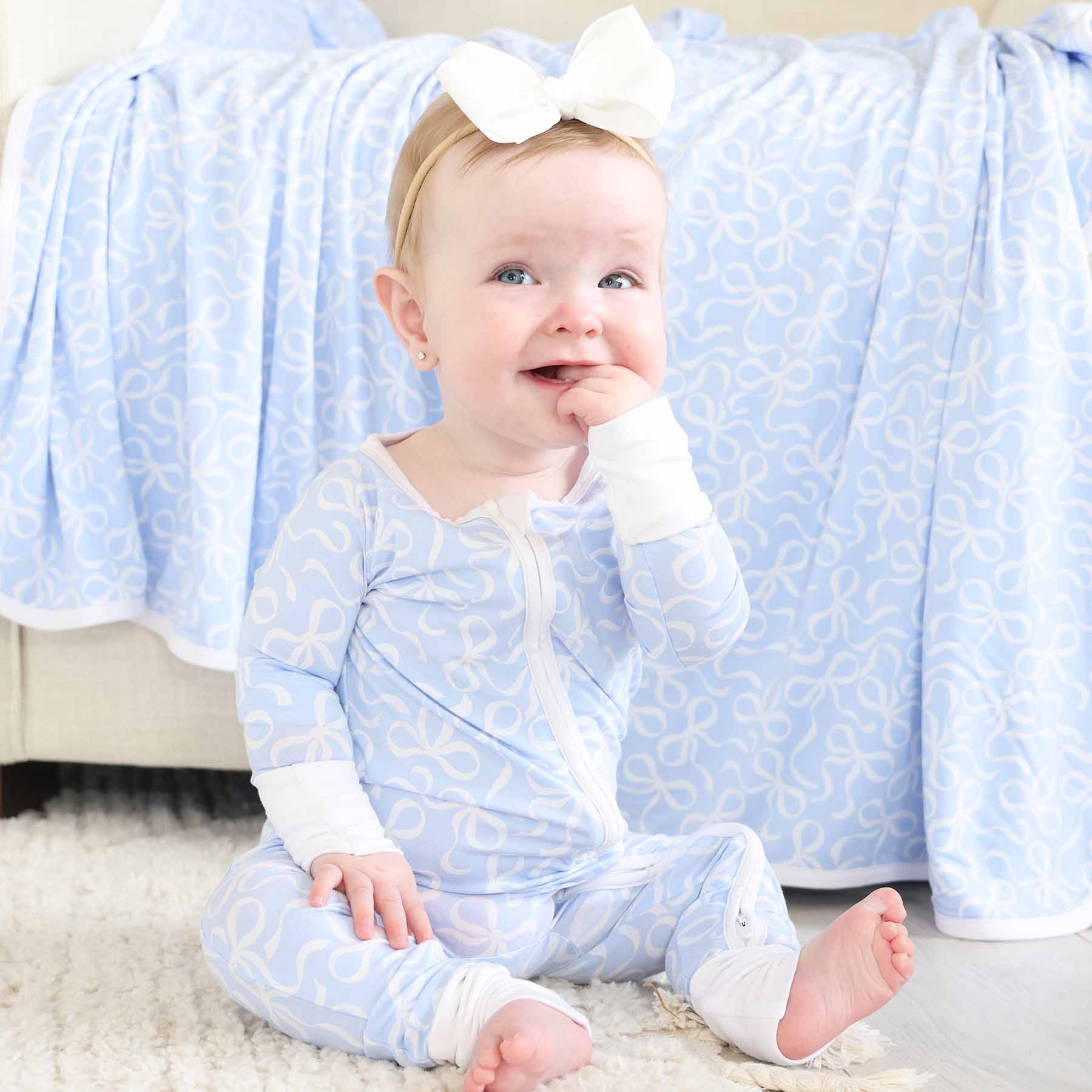 7386-blue-tiful-bows-convertible-zip-romper-1.jpg