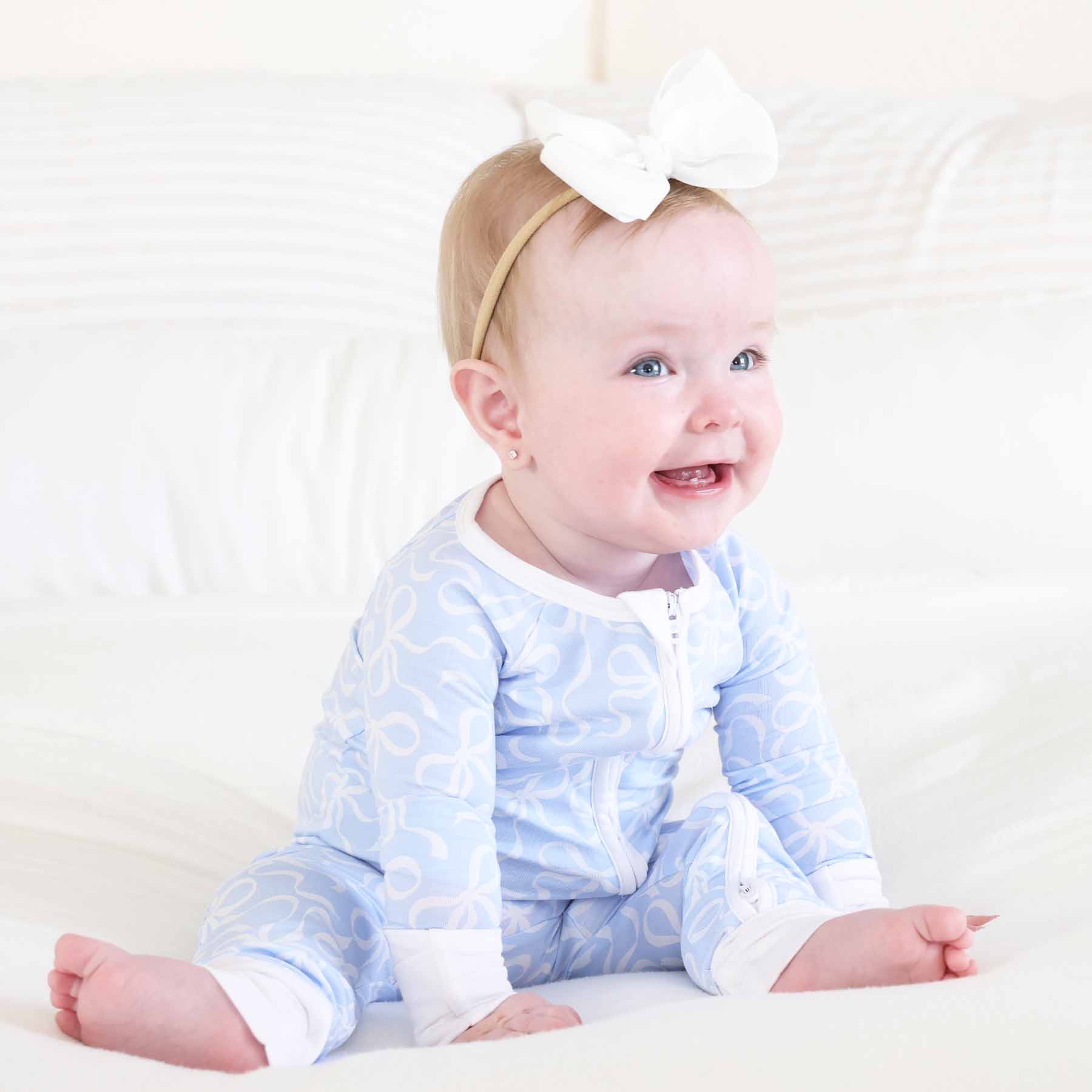 7386-blue-tiful-bows-convertible-zip-romper-1.jpg