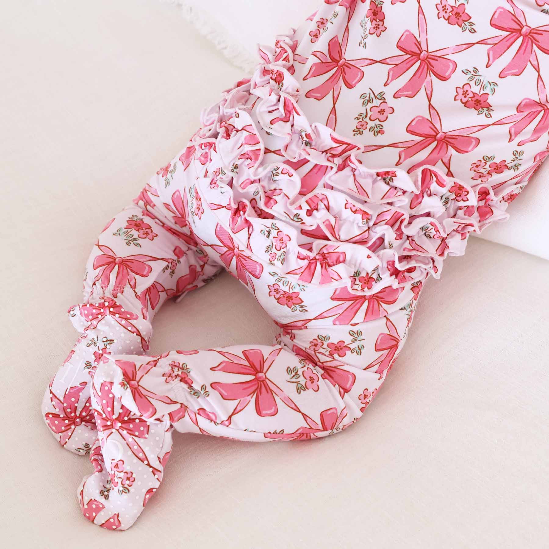 7546-bow-besties-ruffle-zipper-footie-1.jpg
