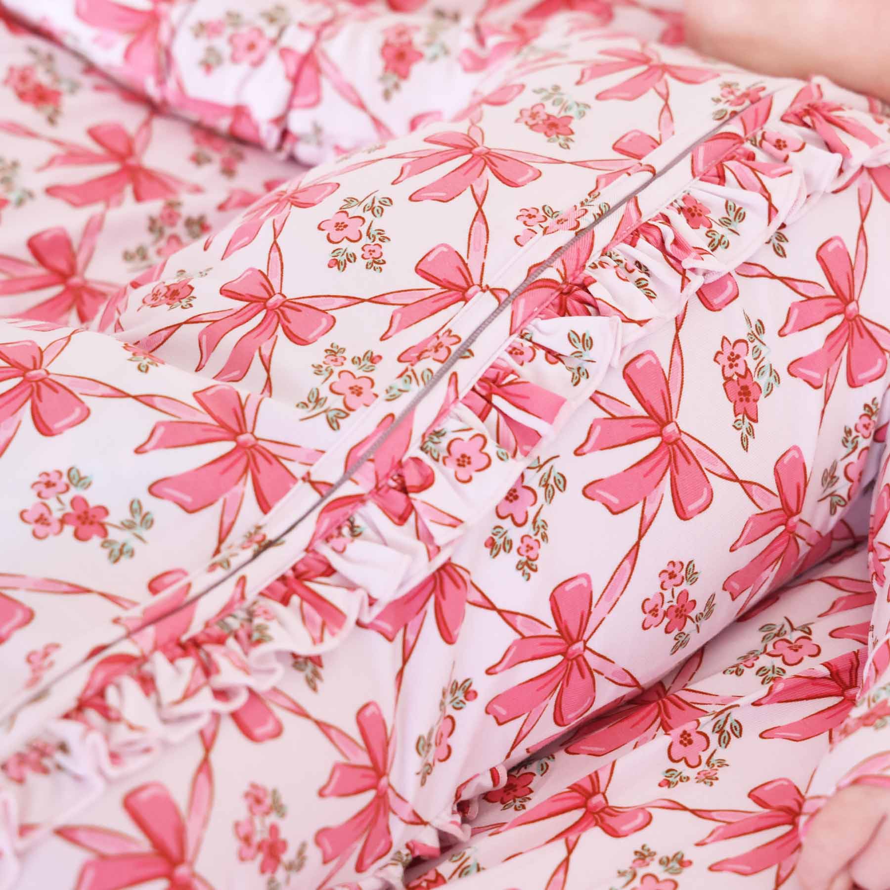 7546-bow-besties-ruffle-zipper-footie-1.jpg