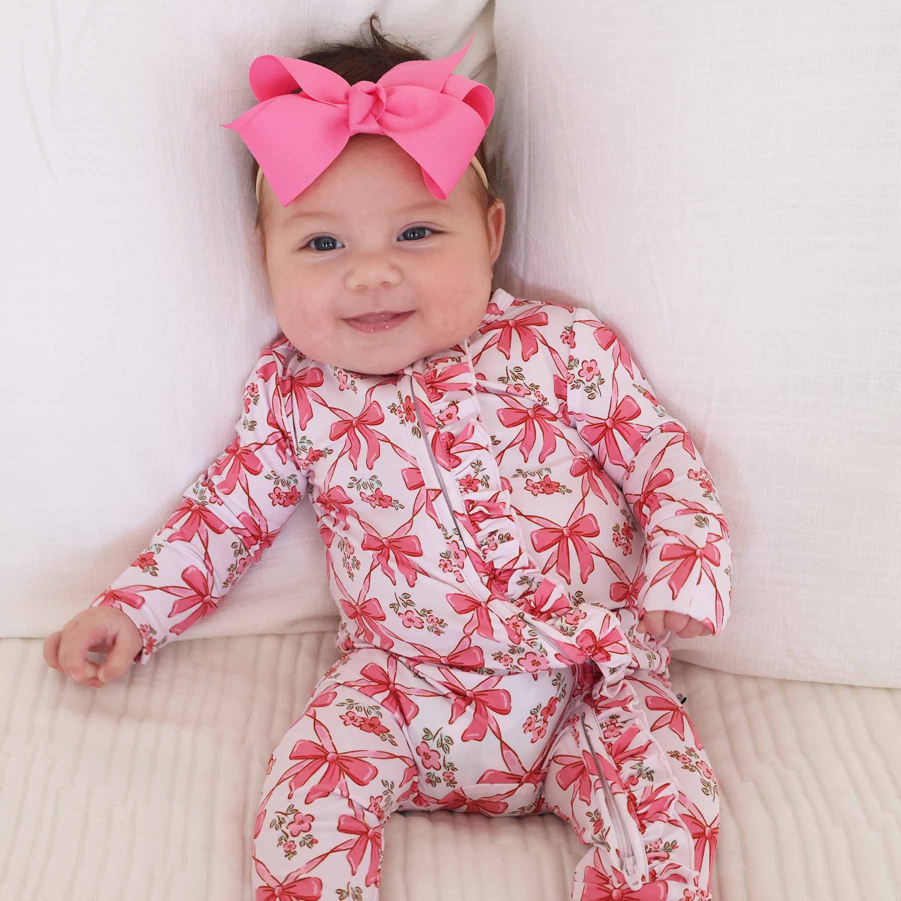 7546-bow-besties-ruffle-zipper-footie-1.jpg