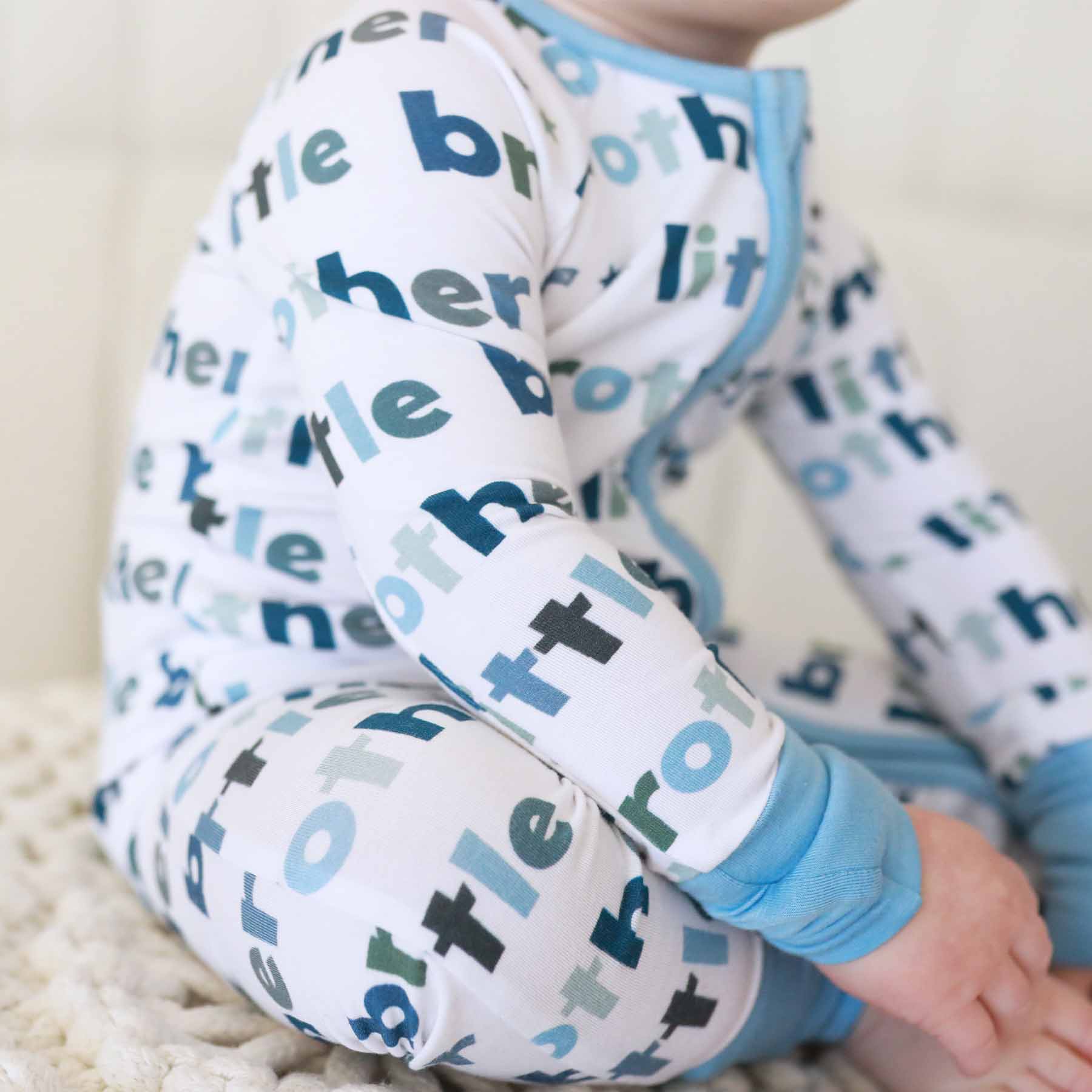 8262-convertible-zip-romper-little-sibling-1.jpg