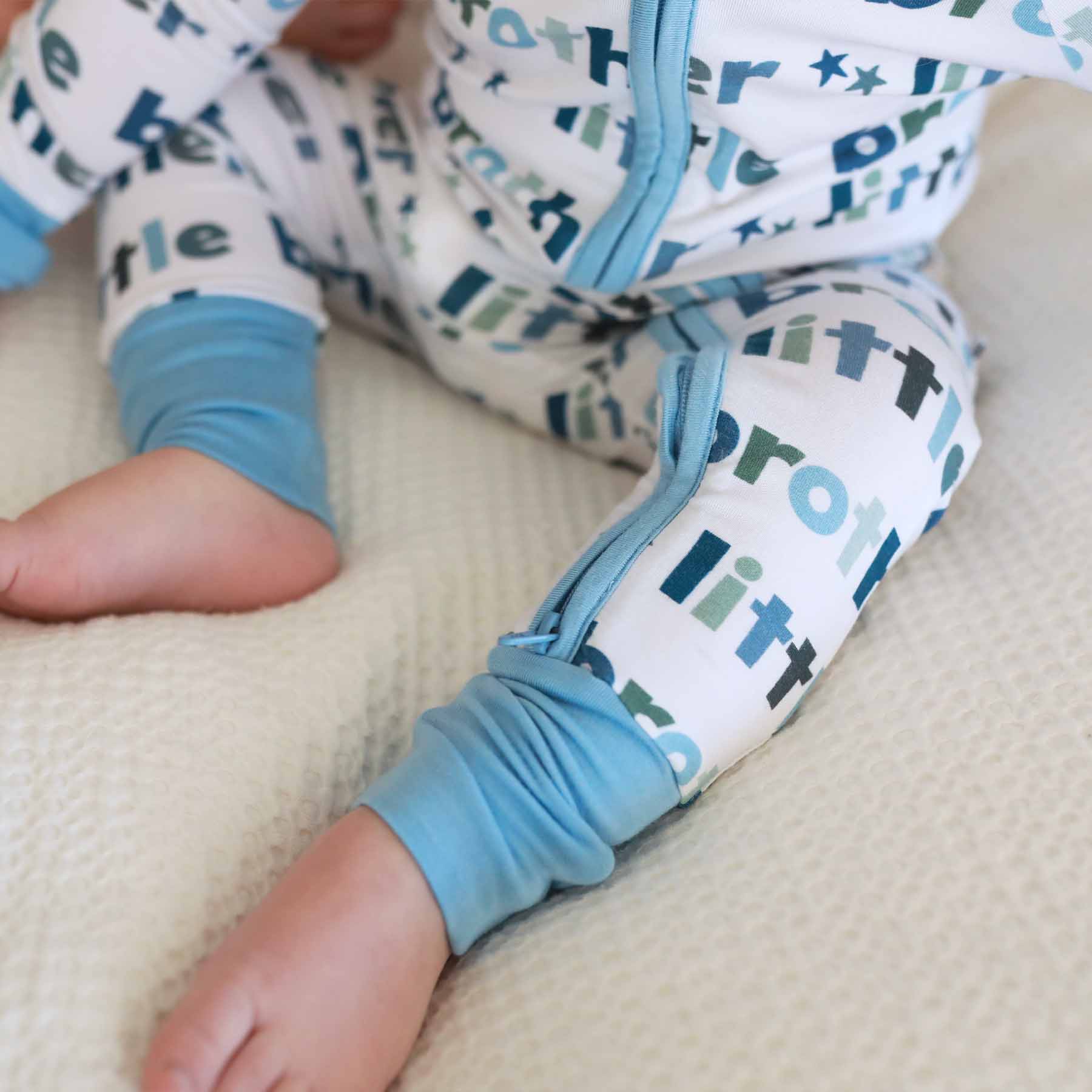 8262-convertible-zip-romper-little-sibling-1.jpg