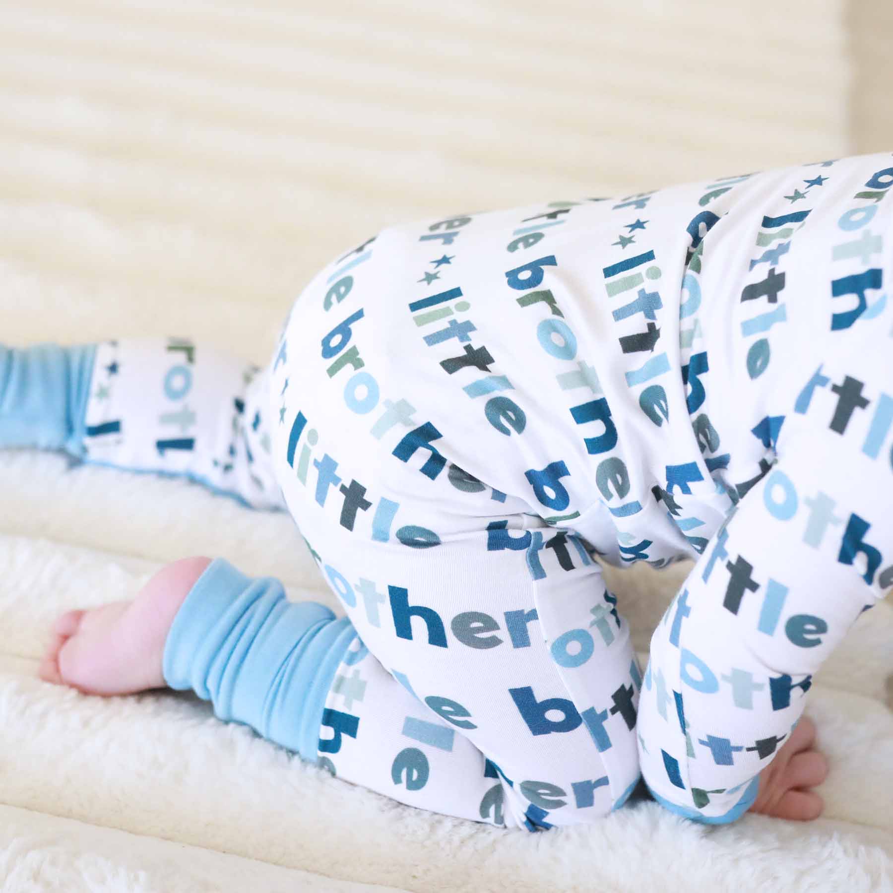 8262-convertible-zip-romper-little-sibling-1.jpg
