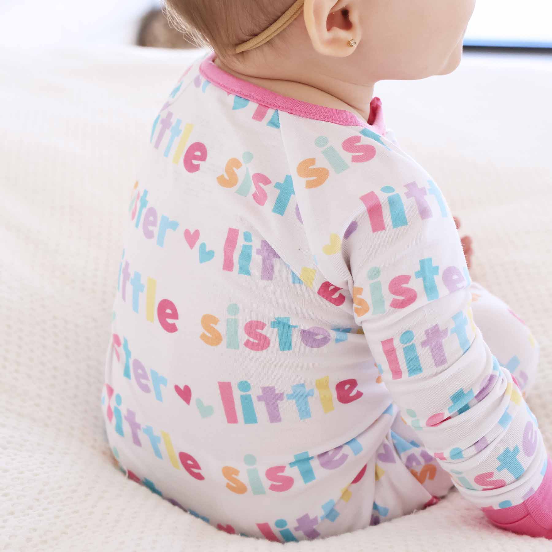 8262-convertible-zip-romper-little-sibling-1.jpg