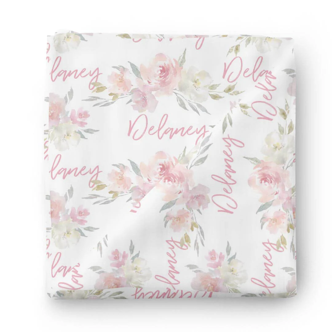 9080-delaney-s-dusty-blush-personalized-baby-name-swaddle-blanket-1.webp