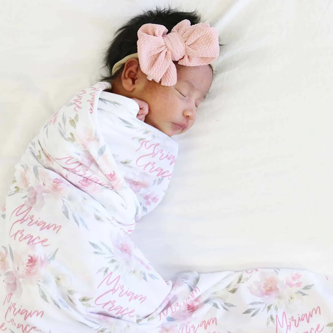 9080-delaney-s-dusty-blush-personalized-baby-name-swaddle-blanket-1.webp